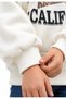 Girl's hooded sweatshirt - off-white with print - relaxed fit - 3