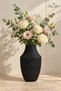 A glass vase with a unique design - 3