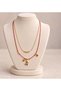 Double Row Butterfly Figured Necklace