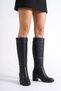 Tumalen heeled women's boot with paneling - black leather