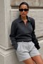 Women's Zippered Polo Collar Ribbed Knitwear Blouse