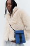 Fluffy funnel-collar jacket