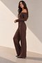 Blouse with an asymmetric neckline, long sleeves, and one shoulder exposed. Long pants with elastic waist. - 2