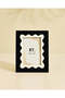 إطار صور أبيض بتفاصيل متموجة - 2