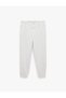 Cotton Three-Threaded Ruffled Sweatpants with Elastic Cuffs, Pockets and Lace-Up Waist