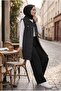 Women's Long Stone-Washed Slim Denim Vest with Collar, Buttoned at the Back, with Pockets and Tassel Details. - 2