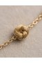 Elegant Necklace with Gold-Colored Knot Detail - 2