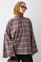 Graue karierte Bluse