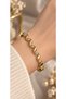 Gold Color Stone Detailed Twisted Model Handcuff Bracelet – Elegant and Stylish Design