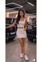 Women's White Denim Mini Skirt with Side Cargo Pockets and Embellishments