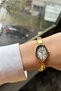 Women's oval case white dial gold color metal band stylish wrist watch