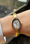 Women's oval case white dial gold color metal band stylish wrist watch - 6
