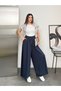 Wide Cut Flared Trousers with Elastic Waist and Double Skirt