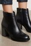Women's Auro Black Side Zipper Heeled Round Toe Boots - 4