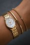 Milano Women's Wristwatch Gold Color Patterned Metal Cord White Dial Stone Detailed Oval Case Analog Watch 26 mm Case Diameter