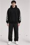 Oversized Hooded Sweatshirt with Dragon Print on the Sleeve