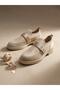 New Season Shoes with Velvet Trim, Elastic Detailing, and Buckle Accents.