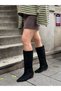 Black Suede (Annie) Flat Boots with a Pointed Toe, Below-The-Knee Length, and Fur Lining.