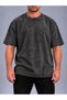 Oversized T-Shirt with a Distressed, Vintage Look.