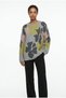 Women's Soft Knit Sweater with Floral Pattern.