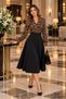 The Elegant Touch of a Wild Pattern – Women’S Black A-Line Midi Crepe Dress with a Leopard Print, Wrap Neckline, and Long Sleeves.