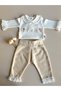 Layla Long-Sleeved Embroidered Bodysuit with Snap Fasteners and Fishtail Detail, in a Cream-Colored Set. - 2