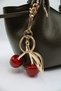 Women's Khaki Crisscross Straps Crossbody Handbag and Shoulder Bag with Knot Detail and Cherry Charm Accessory - 5