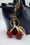 Women's Navy Blue Crisscross Straps Crossbody Handbag and Shoulder Bag with Knot Detail and Cherry Charm Accessory Detail - 5