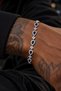 Iced Out Teardrop-Shaped Bracelet with Sapphire-Colored Stones