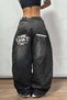 Baggy Black Washed Denim Pants with Back Pocket and Graffiti Embroidery Detail, Y2K Style.