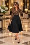 The Elegant Touch of a Wild Pattern – Women’S Black A-Line Midi Crepe Dress with a Leopard Print, Wrap Neckline, and Long Sleeves. - 2