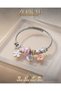 Trendy Steel Chic Women's Charm Bracelet with Flower, Moon, and Star Designs. - 4