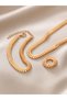 طقم سلسلة ذهبية وقلادة وسوار وخاتم