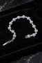 Iced Out Bracelet with Small Stone Embellishments and Waterway Design - 2