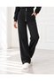 Women's Two-Piece Set: Soft-Textured Jacket with Bomber Collar, Long Sleeves, Snap Buttons, and Pockets, and Soft-Textured, Comfortable-Fit Pants with Elastic Waistband, Drawstring, and Loose Legs, in Black. - 6
