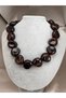 STUNNING MODERN DESIGN WOMEN'S NECKLACE WITH LARGE OVAL BEADS, MARBLE PATTERN, AND AN ASYMMETRICAL SHAPE