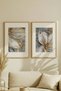 2 VINTAGE PAINTINGS WITH NATURAL WOOD FRAMES FEATURING ABSTRACT FLOWERS AND GOLDEN REFLECTIONS - 2