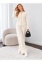 Women's Knit Two-Piece Set with Button and Zipper Details, Featuring Wide-Leg Trousers.