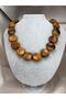 STUNNING MODERN DESIGN WOMEN'S NECKLACE WITH LARGE OVAL BEADS, MARBLE PATTERN, AND AN ASYMMETRICAL SHAPE