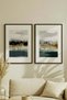 2 VINTAGE PAINTINGS WITH BLACK WOODEN FRAMES FEATURING A SERENE HORIZON CONCEPT - 2