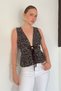 Sequined blouse with string ties