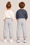 Kids' Girls' and Boys' School and Everyday Use Unisex Jogger Pants in Heather Gray, with Elasticated Hems, Pockets, and Drawstrings, Ages 3–10 - 3