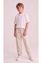 KIDS' CREAM-COLORED PANTS WITH ELASTIC WAISTBAND, CARGO POCKETS, AND A RELAXED FIT