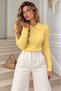 Women's polo collar button-up knit sweater with braided pattern