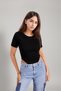 Women's black short-sleeved ribbed bodysuit with snap fasteners at the bottom. - 2