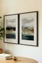 2 VINTAGE PAINTINGS WITH BLACK WOODEN FRAMES FEATURING A SERENE HORIZON CONCEPT - 3