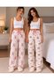 Women's Pajama Bottoms with a 2-Piece Cotton Satin Ribbon Detail and a Pink Ribbon Pattern.