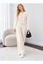 Women's Knit Two-Piece Set with Button and Zipper Details, Featuring Wide-Leg Trousers. - 4