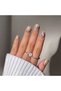 Nude press-on nails with soft colorful designs - 2