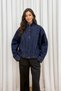 DENIM JACKET WITH MOCK NECK, ELASTIC WAISTBAND, AND HIDDEN ZIPPER—NAVY BLUE